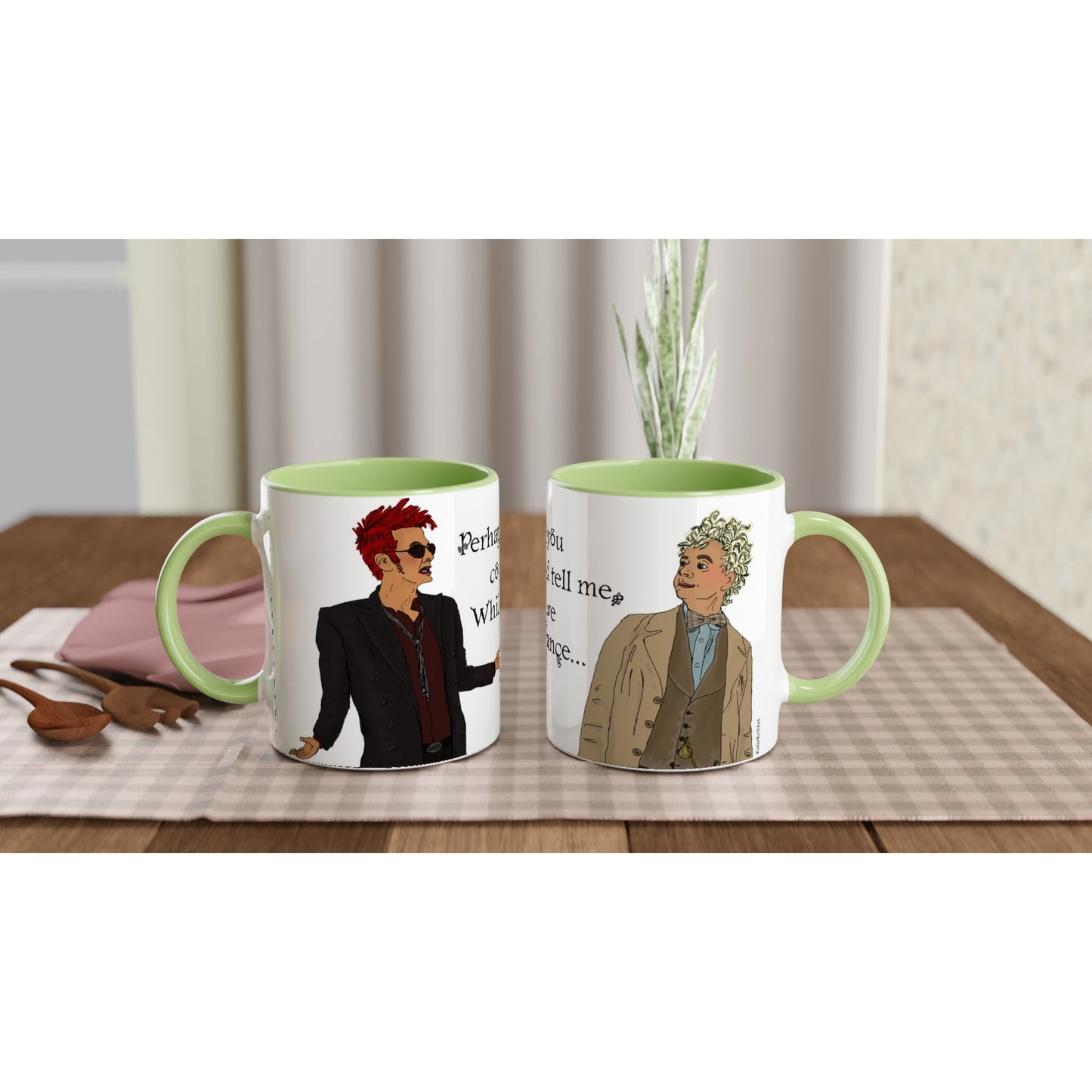 A white cup with an angel and demon inspired by Good Omens, dancing, with the text: Perhaps you could tell me, while we dance printed on. The rim and handle is lime green.