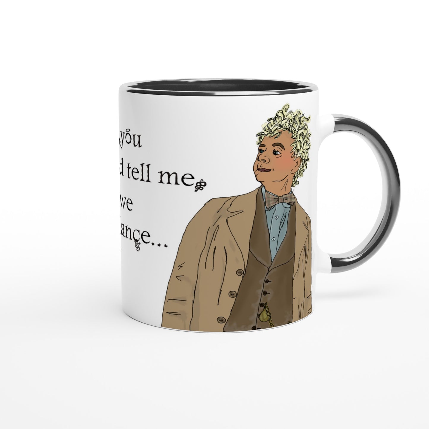 One side of a white cup with an angel in a beige suit a bow tie and blonde hair inspired by Good Omens printed on. The rim and handle is black.